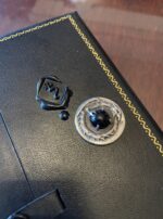 Saturn in Capricorn coin talisman dragon