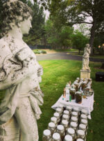 Venus Aerial Delight Libra statues looking at one another