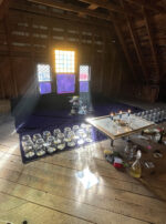 Thema-Mundi-Jupiter-Candles-Hand-Window-Reflections-Illuminating-Prayers